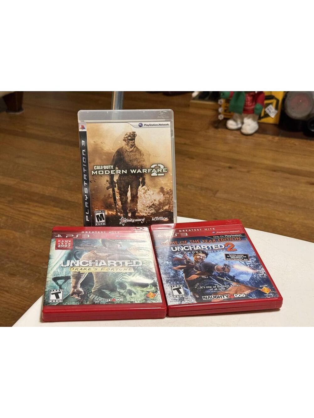 PS3 Games Lot Of 3 , Call Of Duty Modern Warfare 2, Uncharted , Uncharted 2